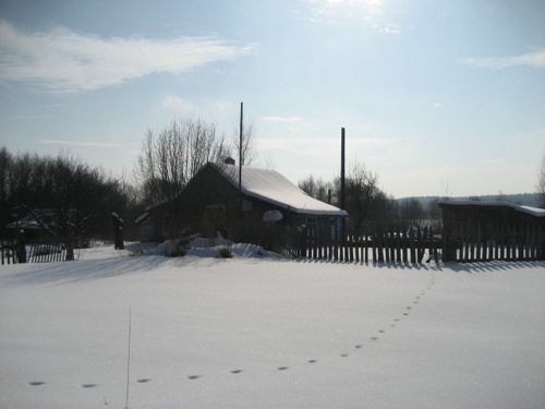This is a Russian Datcha or summer home. It's not much of a place to live in the Winter but it is pretty non the less.